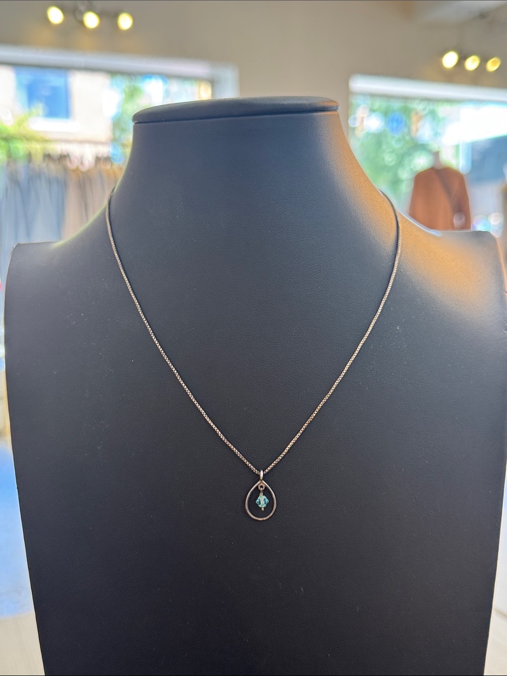 Sterling silver chain necklace with blue pendant